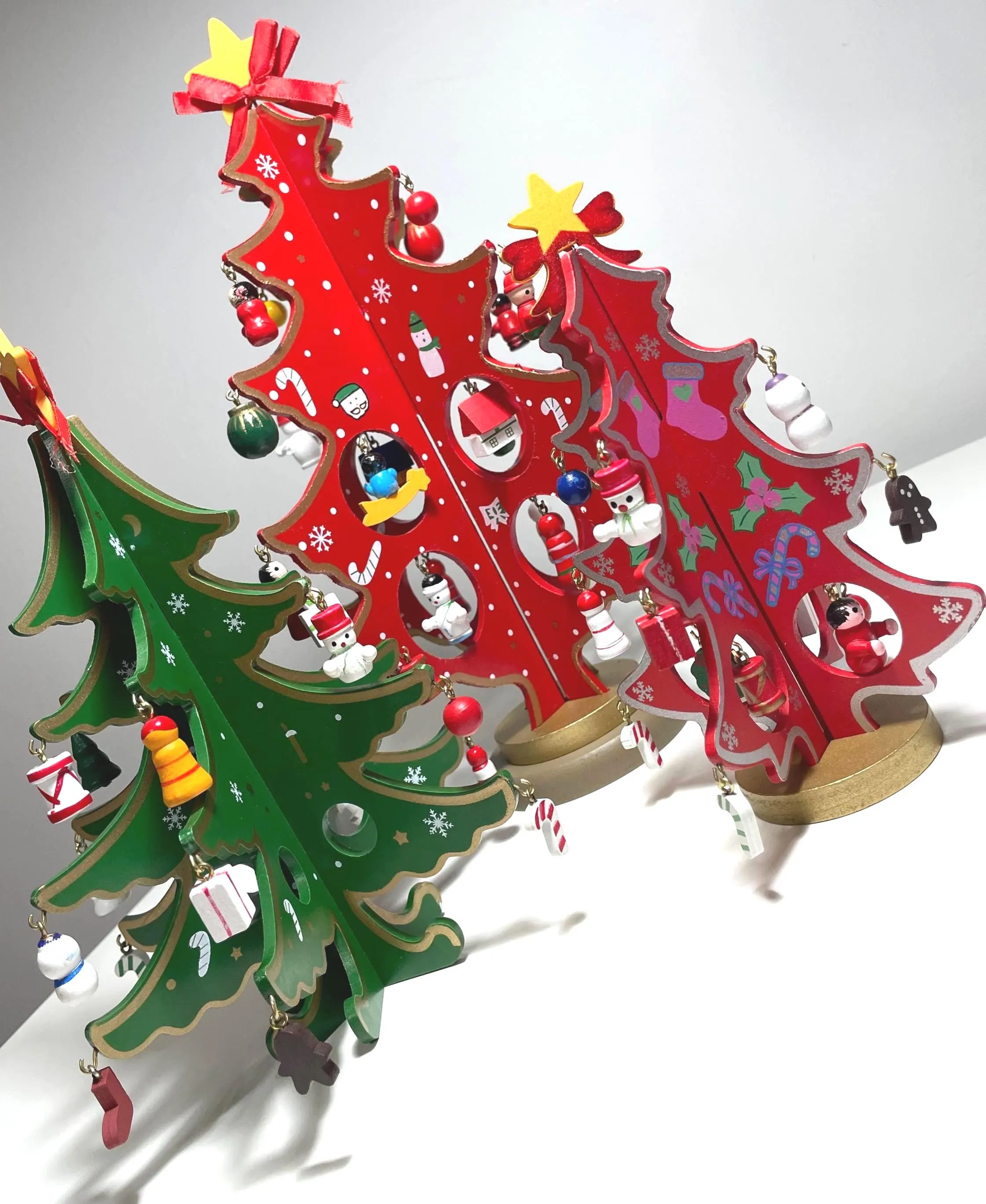 Bring instant holiday magic to your home with this DIY Wooden Christmas Tree Kit. Assemble, decorate, and display a charming tabletop tree in minutes—perfect for mantels, desks, shelves, classrooms, or gift tables. A fun family craft activity that doubles as beautiful holiday décor and a thoughtful seasonal gift.