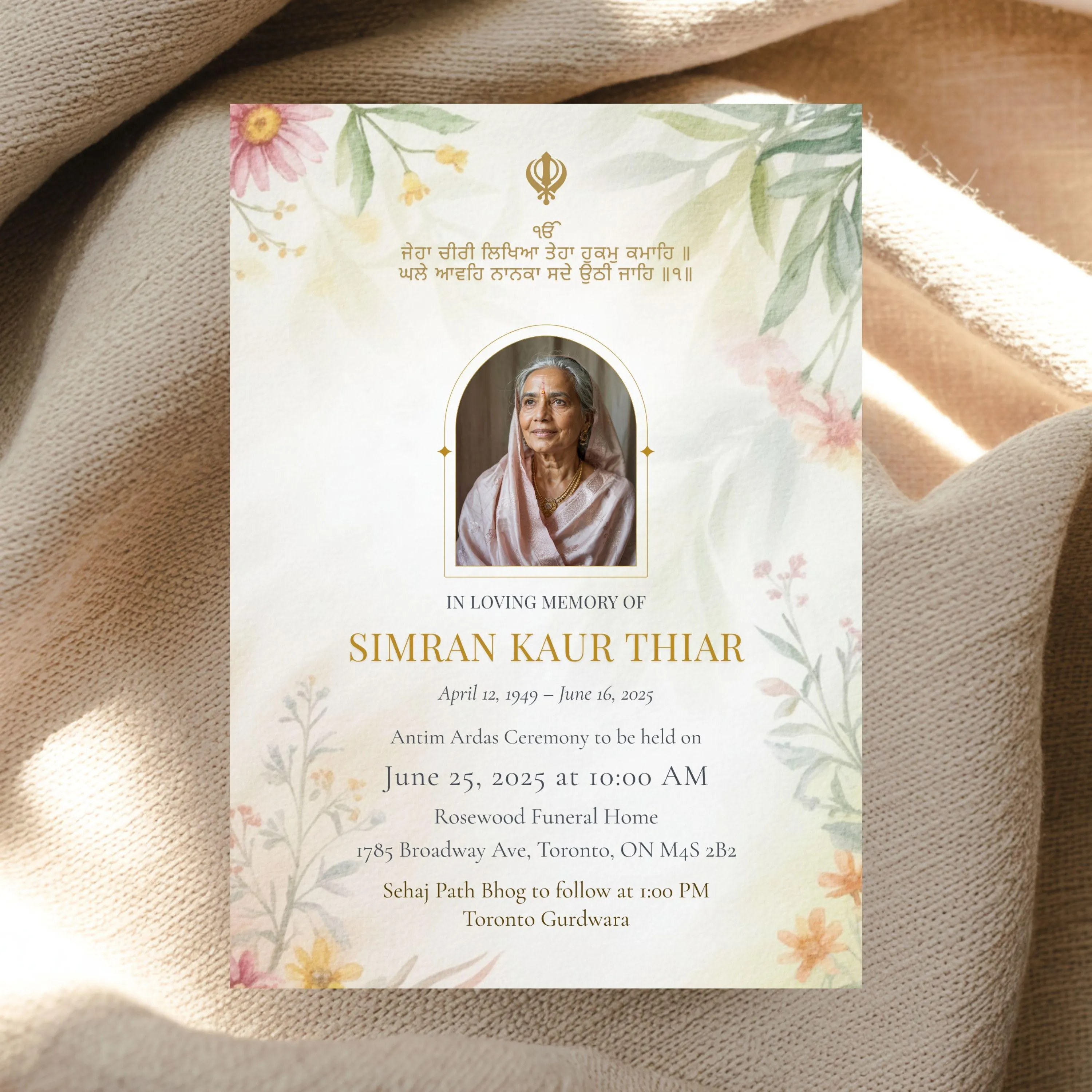 Floral Sikh memorial invitation design with photo, peaceful remembrance Canva template displayed on soft fabric background