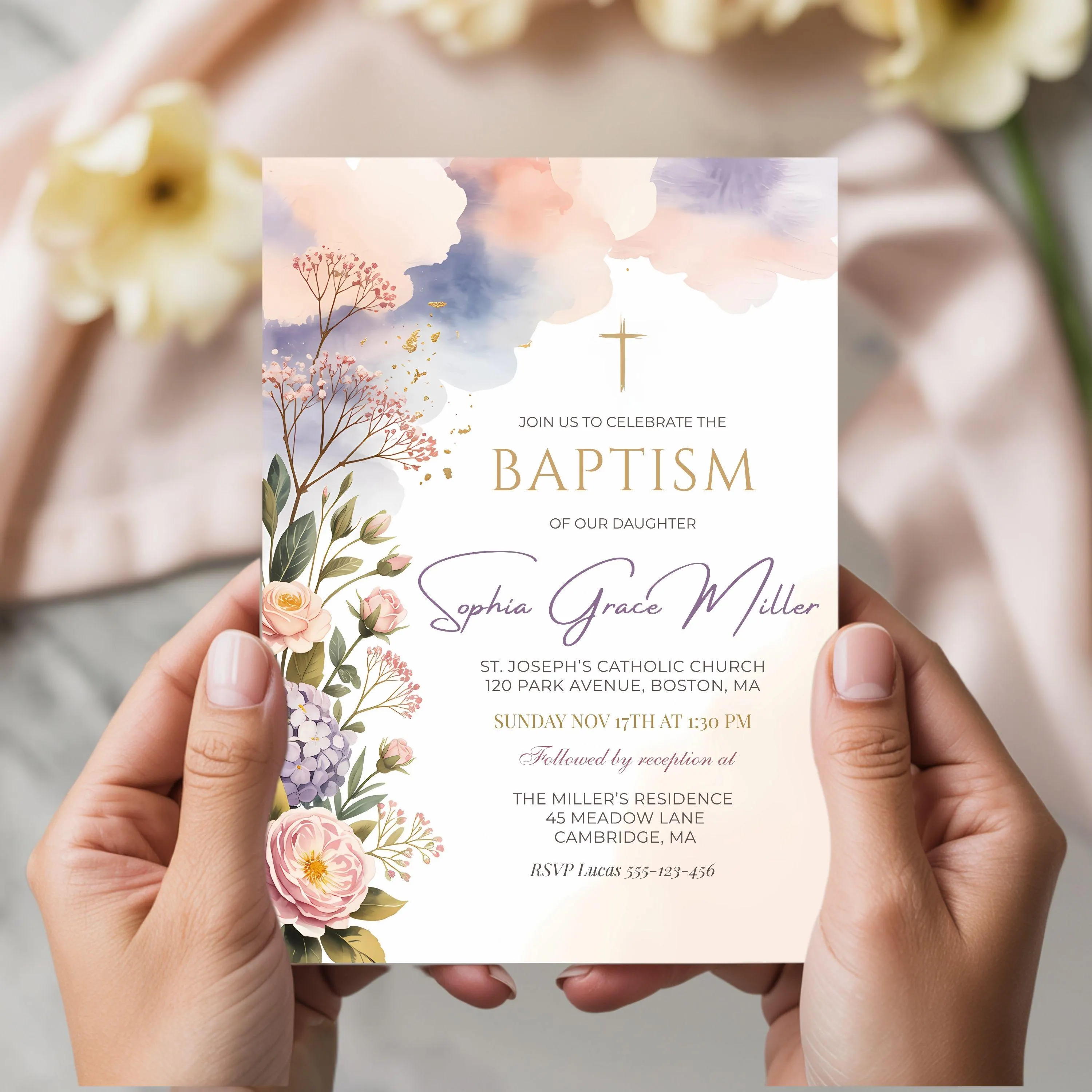 Elegant baptism invitation card mockup held in hands, floral watercolor design with gold cross and pastel flowers