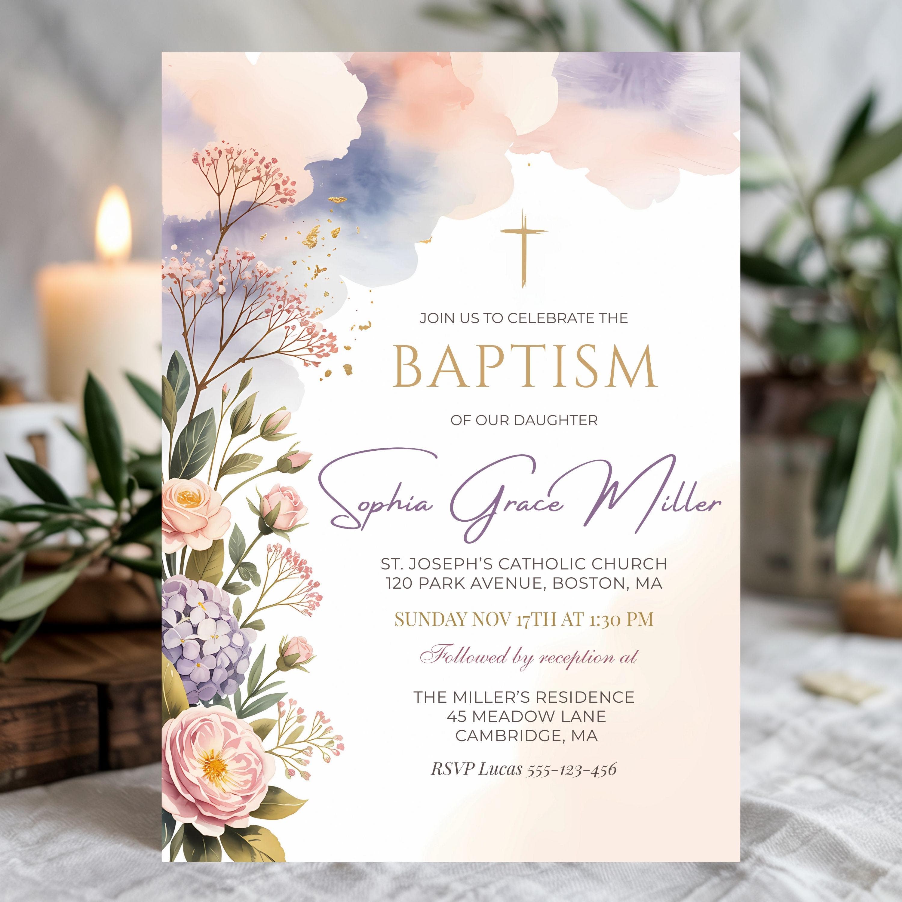 Baptism invitation displayed with candles and greenery, elegant watercolor floral design with gold cross