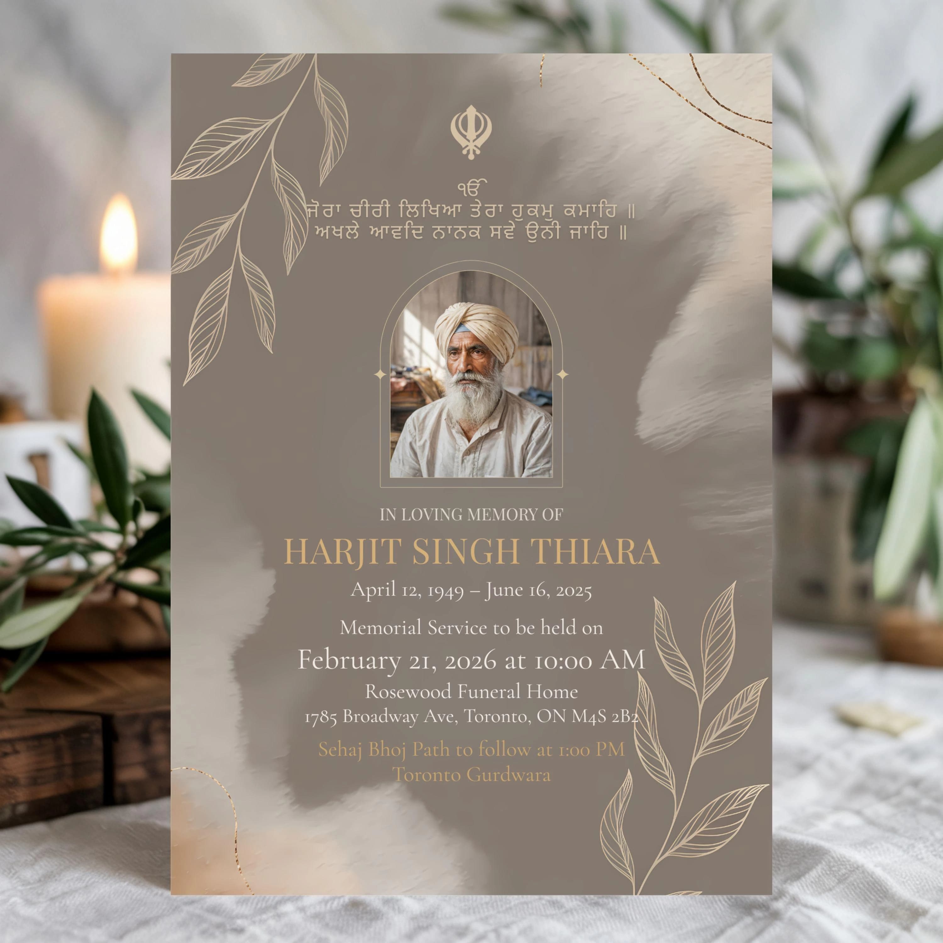 Memorial poster displayed near a lit candle and greenery, conveying remembrance, serenity, and spiritual reflection.