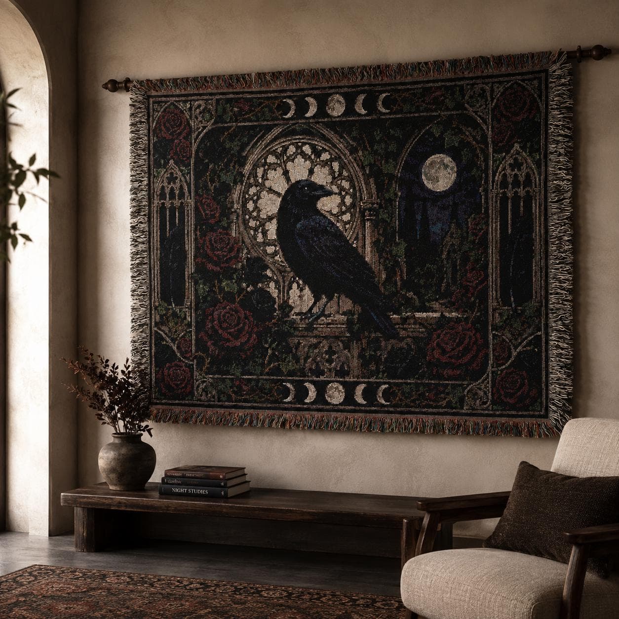Horizontal woven blanket wall hanging with a black raven in a gothic stone archway, surrounded by red roses, moon phases, full moon, cathedral windows, dark vines, ornate border, and fringed textile edges.