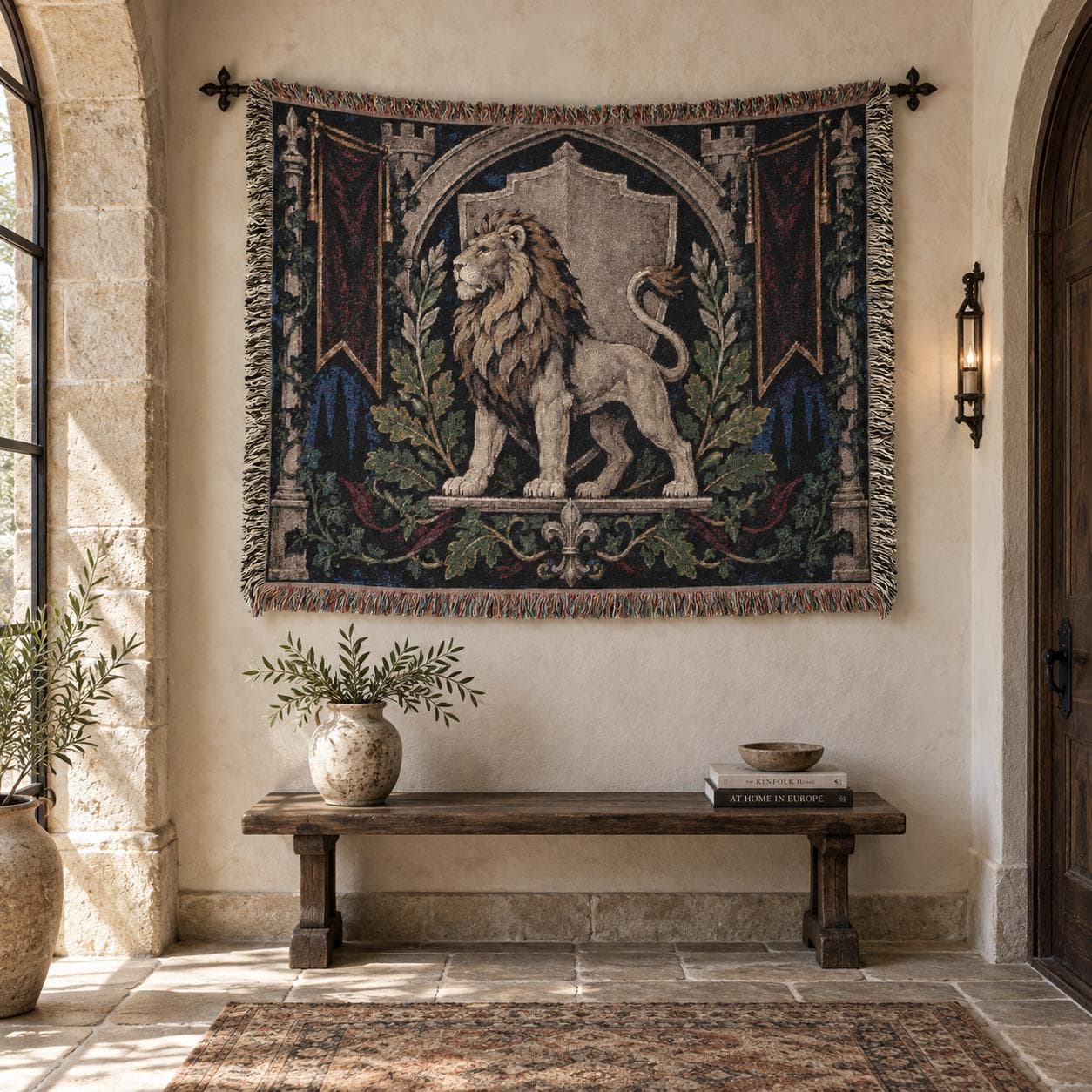 Horizontal woven blanket wall hanging featuring a medieval heraldic lion standing before a shield backdrop, with gothic arch framing, red banners, laurel branches, oak leaves, castle-style details, and fringed textile edges.
