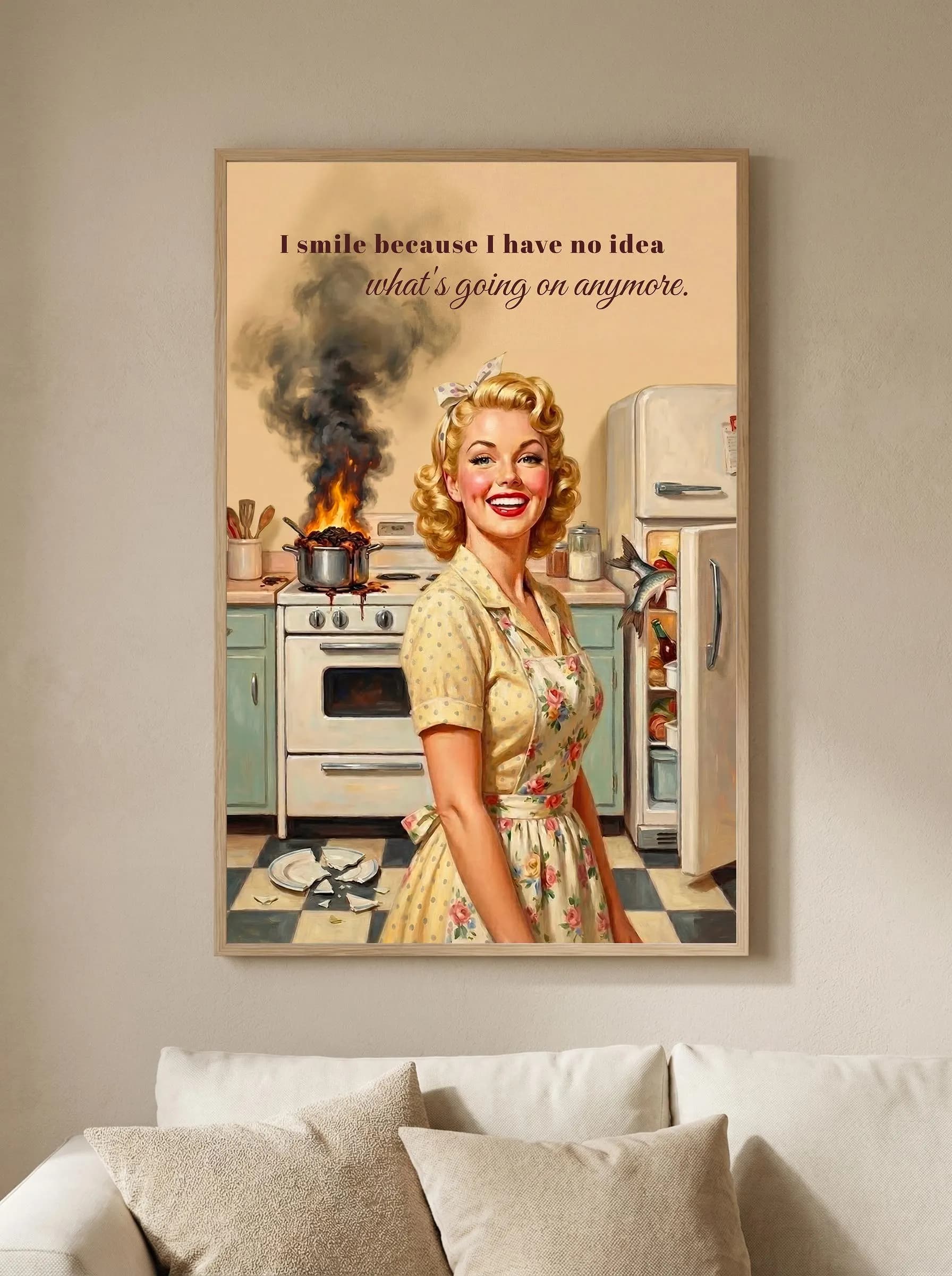Adulting is hard poster — pin up art with housewife in yellow floral dress, retro kitchen, pan fire and smoke on stove. "I smile because I have no idea what's going on anymore." script text. Vintage beige aesthetic.