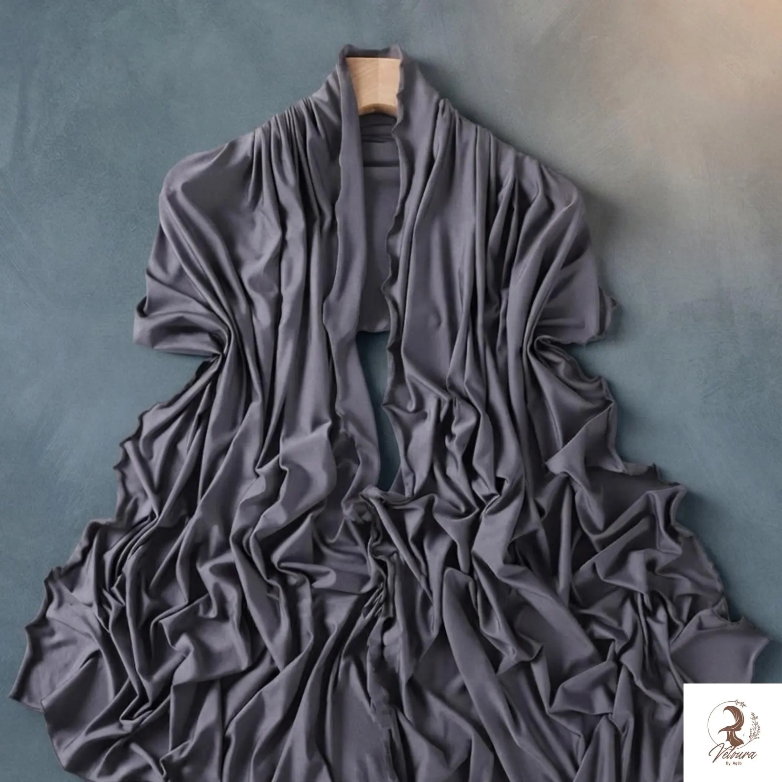 Wavy-edge hijab paired with neutral clothing for a coordinated look.