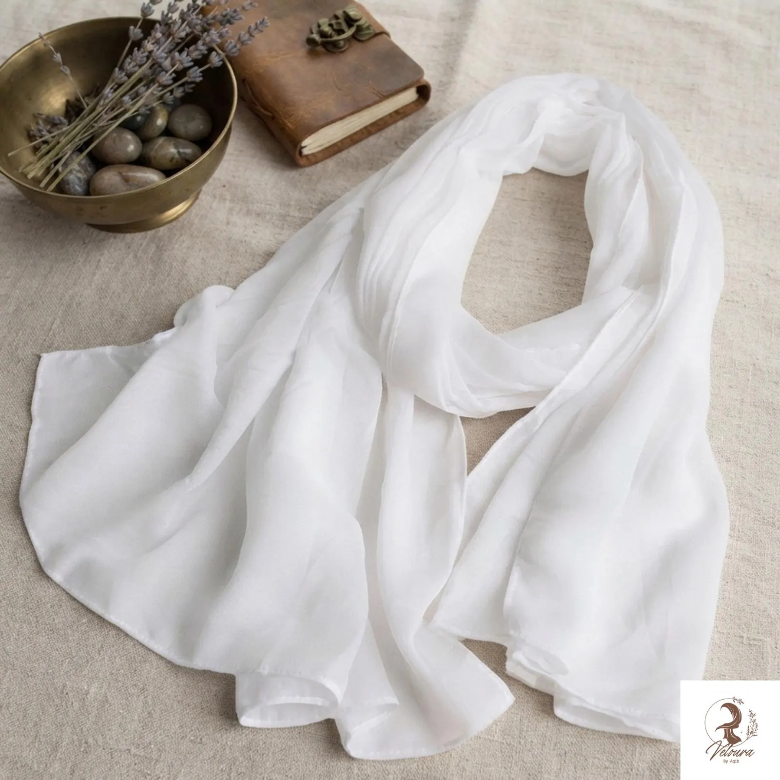 Soft-looking scarf arranged around the head for everyday wear