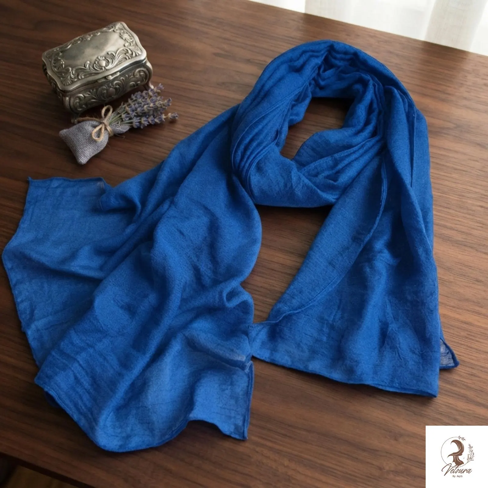 Solid scarf folded neatly to show its full color and shape