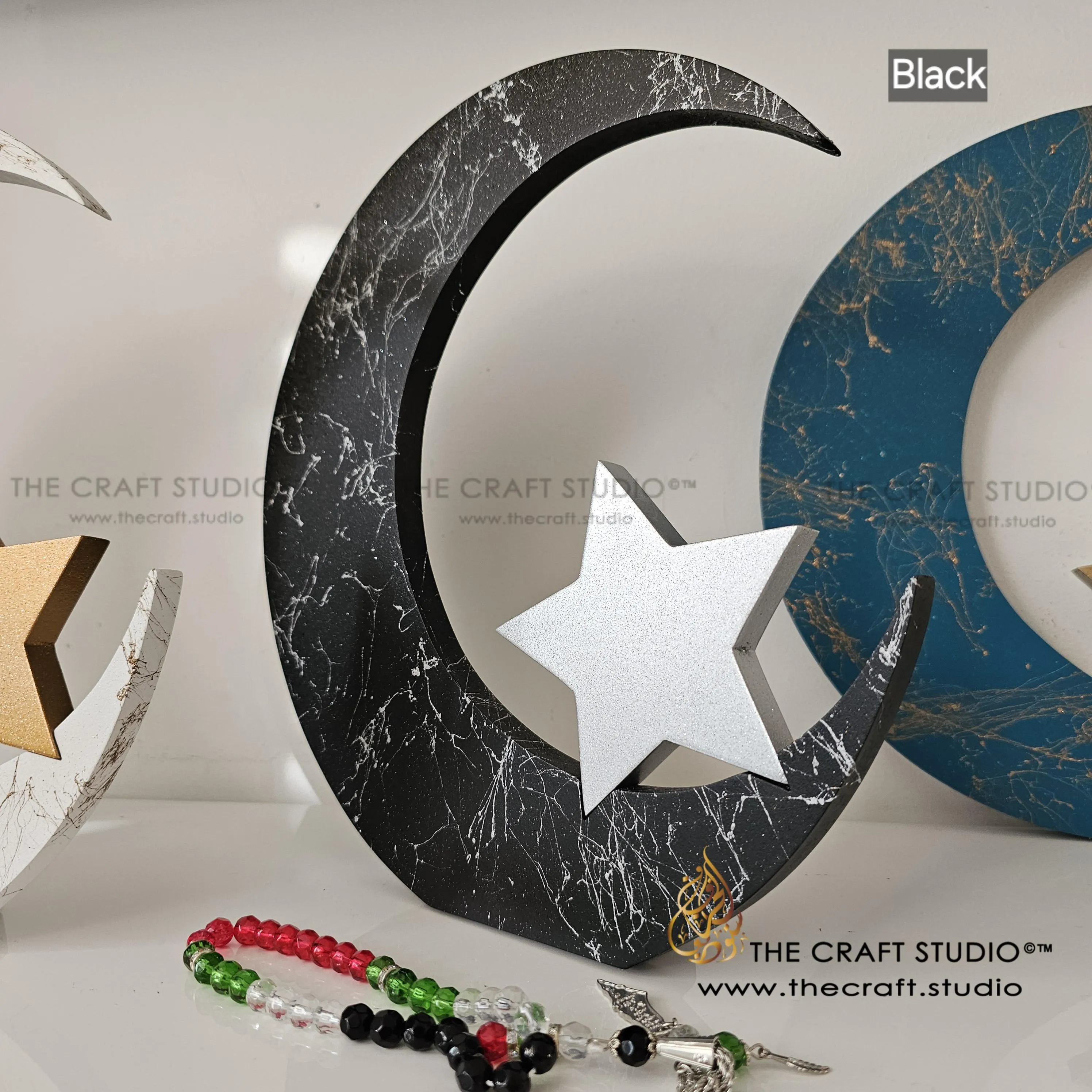 Black marble effect moon and star decoration