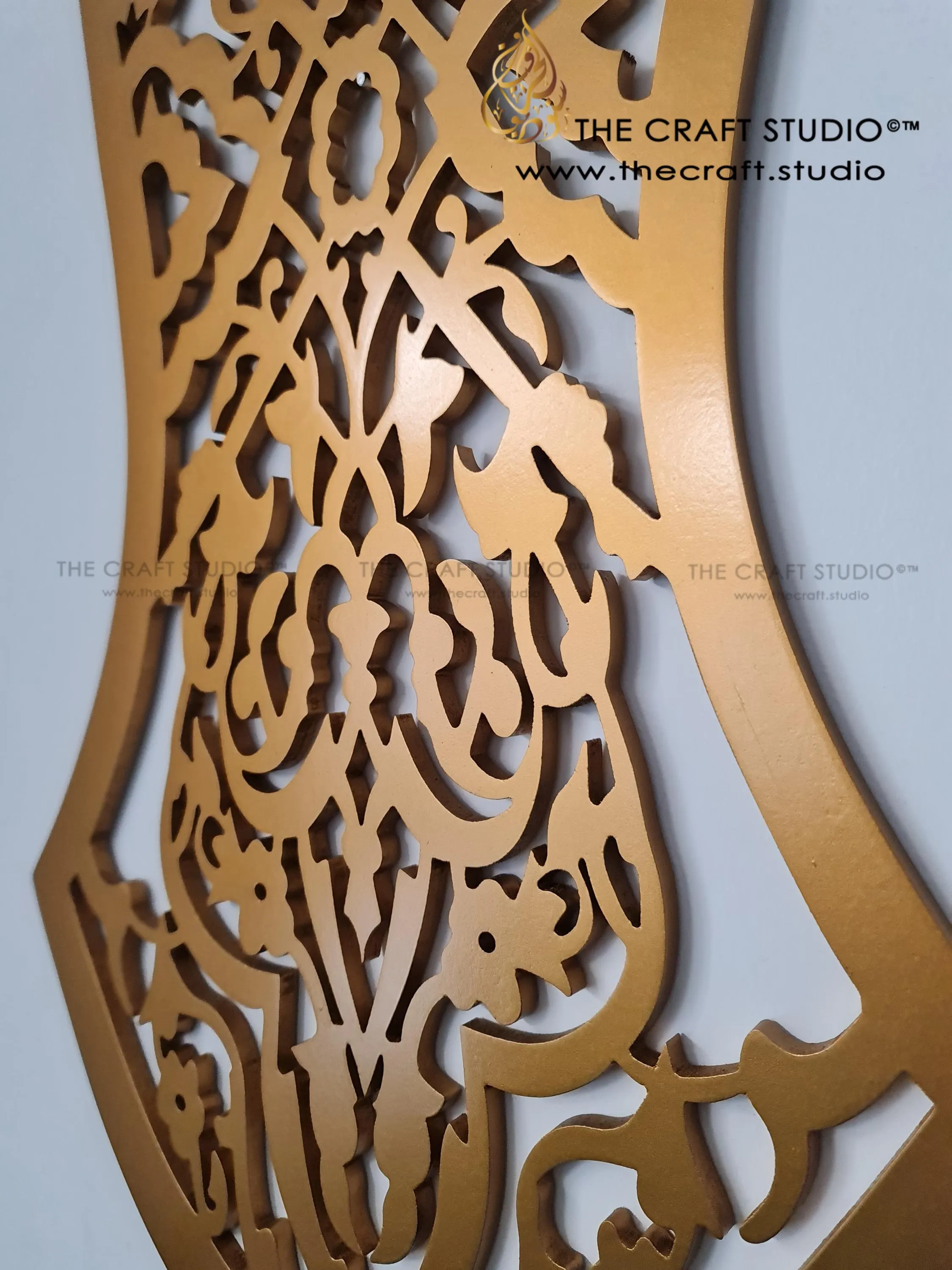 Intricately hand carved arabesque pattern in shape of the nalayn prophetic sandal. Finished in antique gold. Hanging on a wall