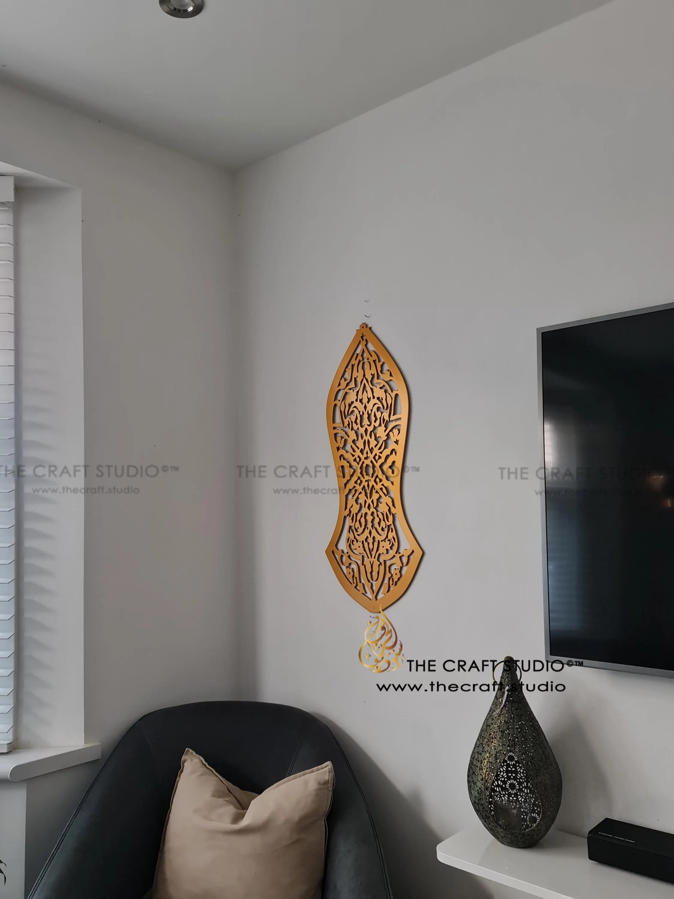 Intricately hand carved arabesque pattern in shape of the nalayn prophetic sandal. Finished in antique gold. Hanging on a wall