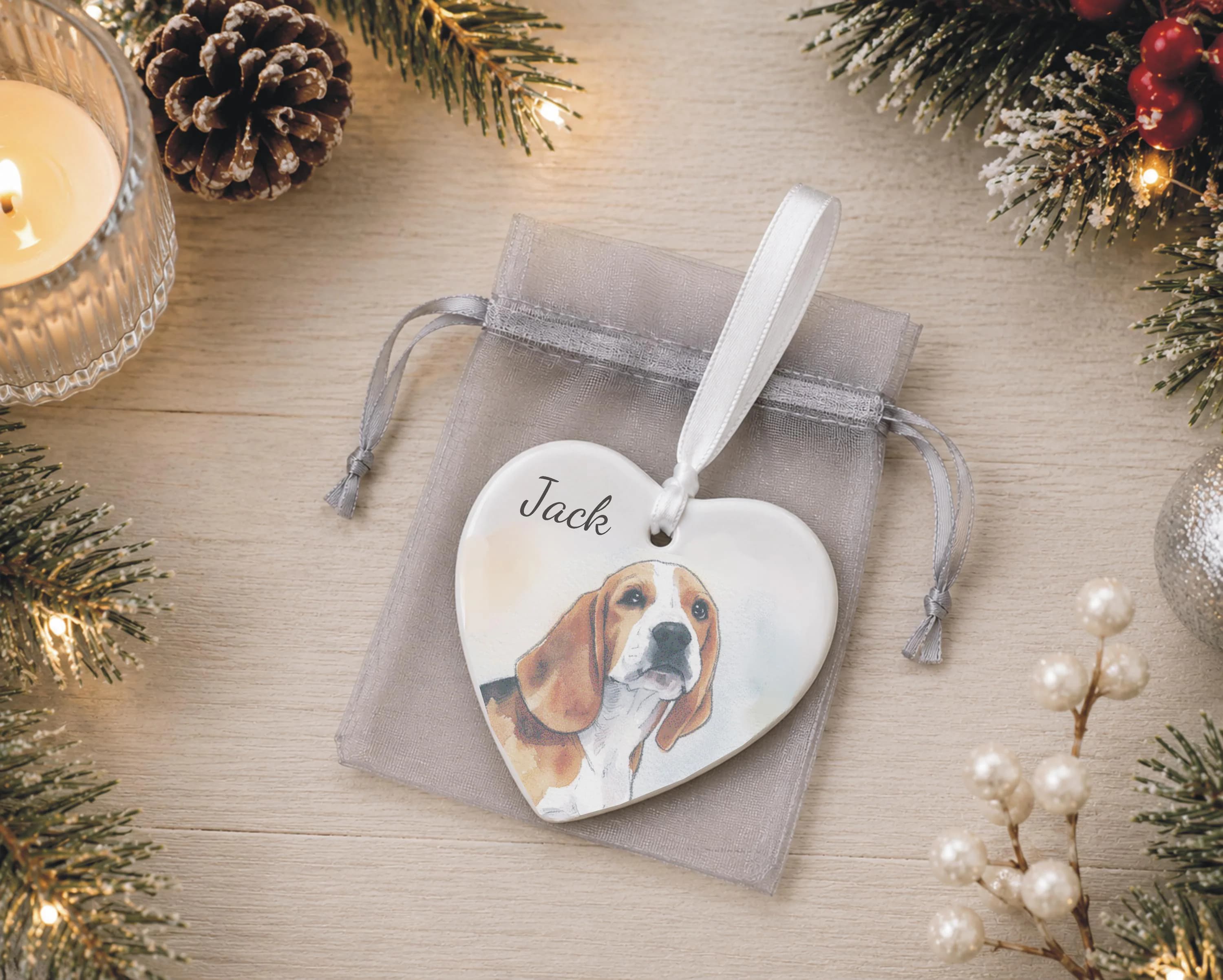 Custom personalised dog Christmas ornament supplied with a white hanging ribbon and organza gift bag, ready to give as a Christmas gift for a dog lover or pet owner.